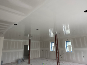 Finished drywall ceiling ready for primer in a new Kansas City home